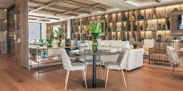 a room with a table and chairs