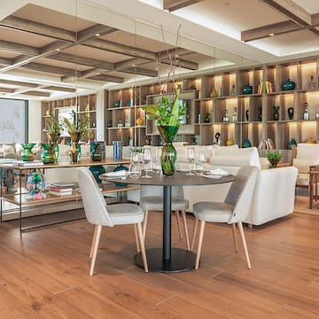 a room with a table and chairs