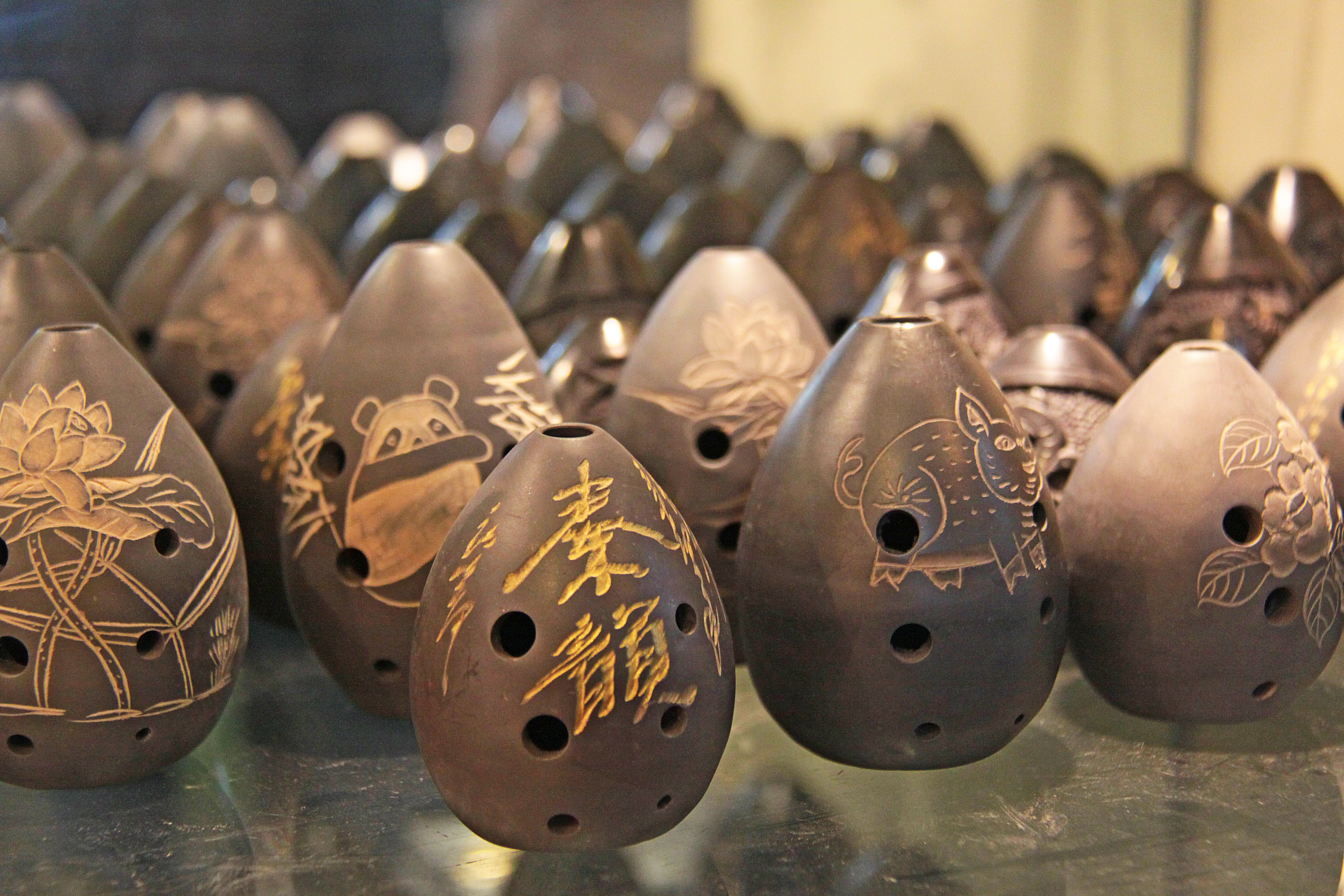 a group of objects with designs on them