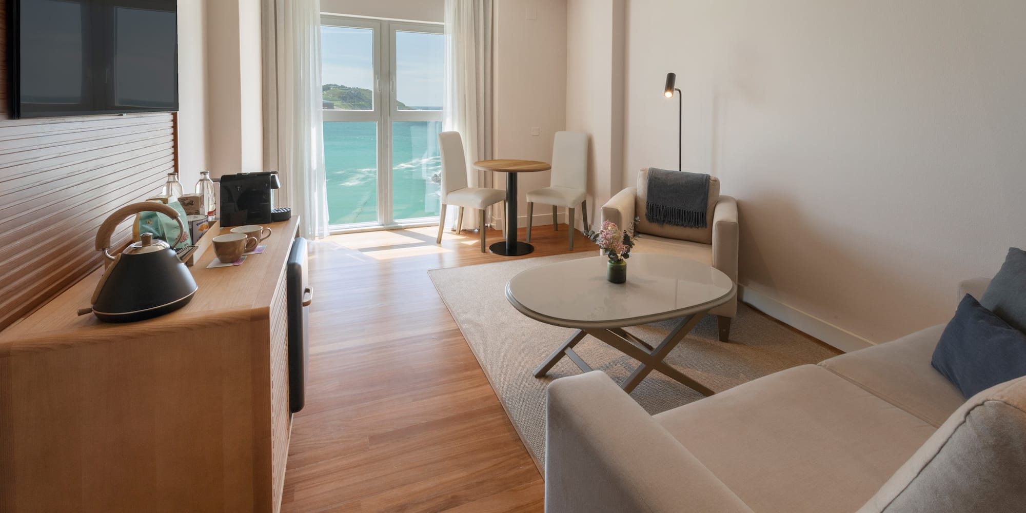 a room with a view of the ocean