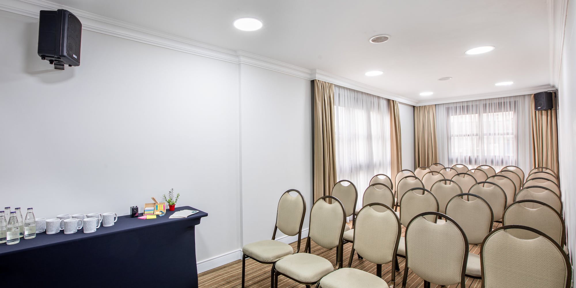 a room with chairs and a table