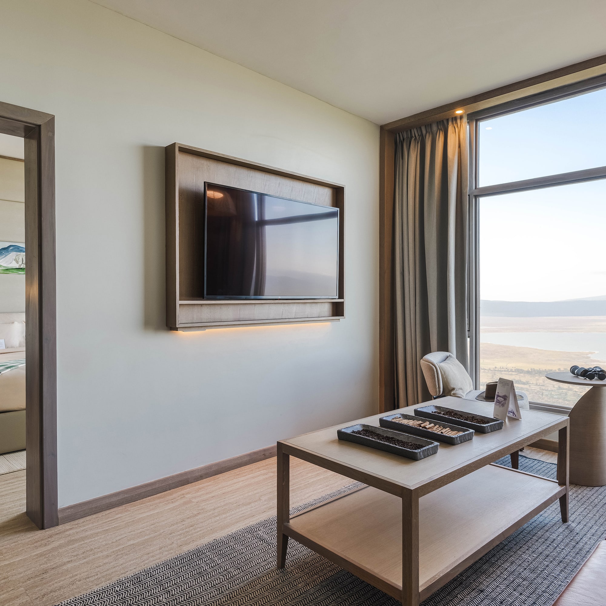 a room with a television and a table