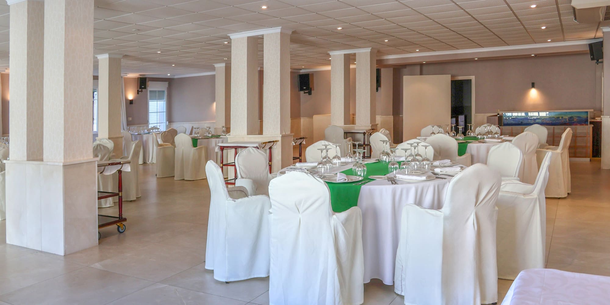 a room with tables and chairs