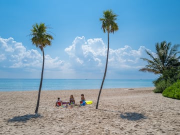 a group of people on a beach