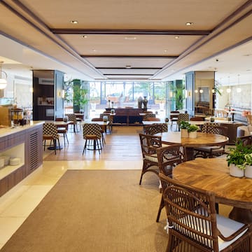 a room with tables and chairs