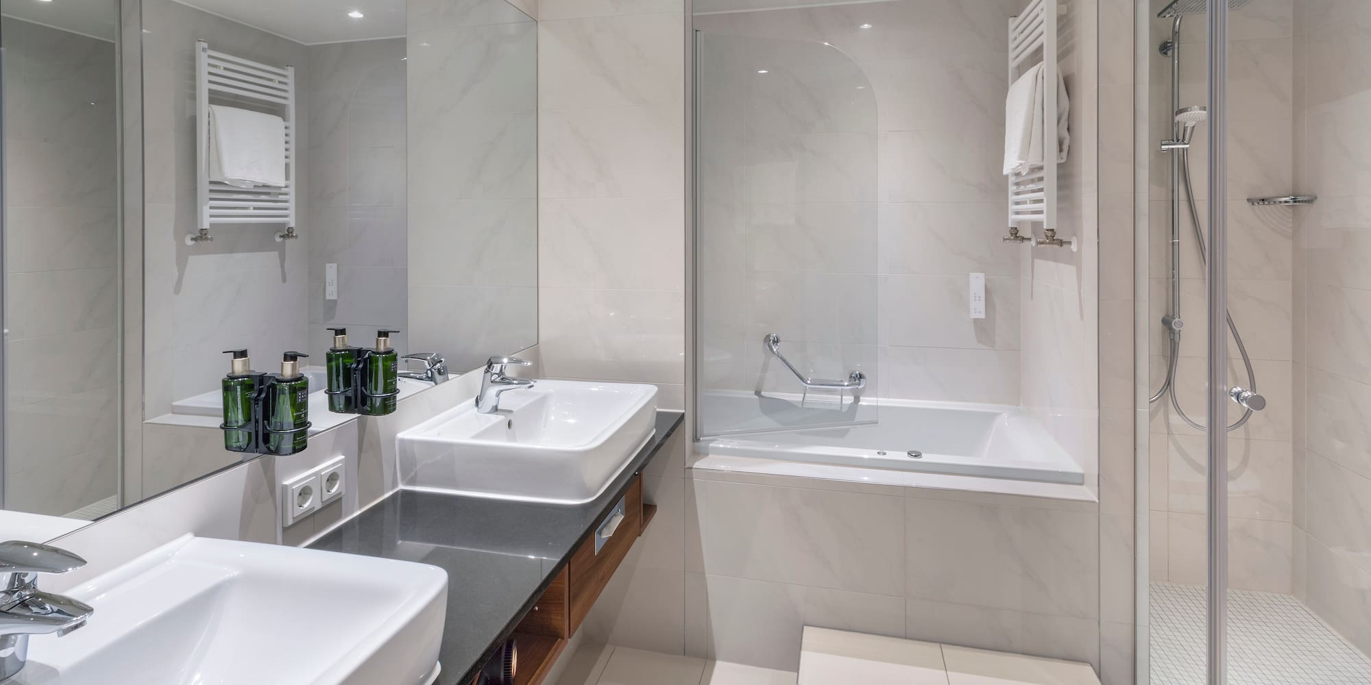 a bathroom with a bathtub and sink