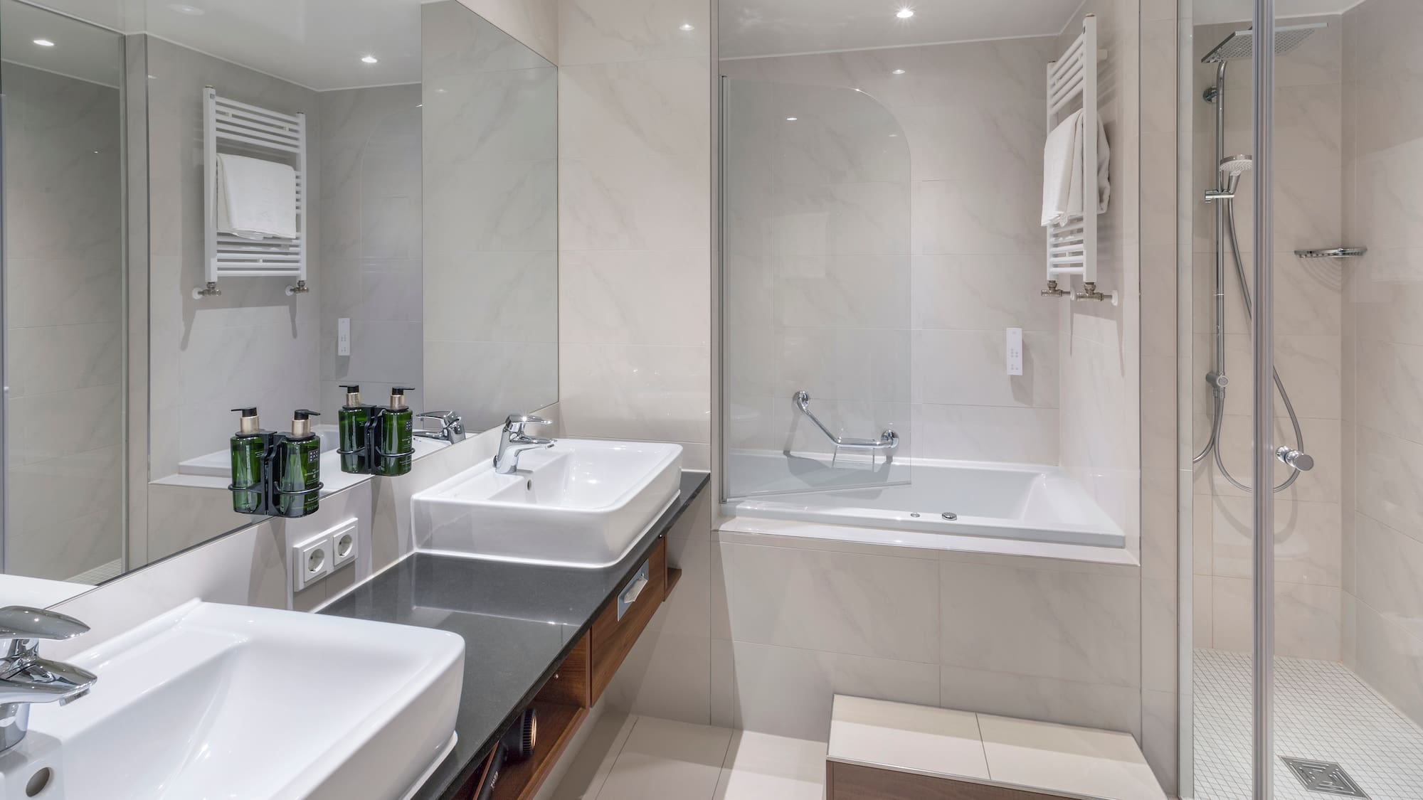 a bathroom with a bathtub and sink