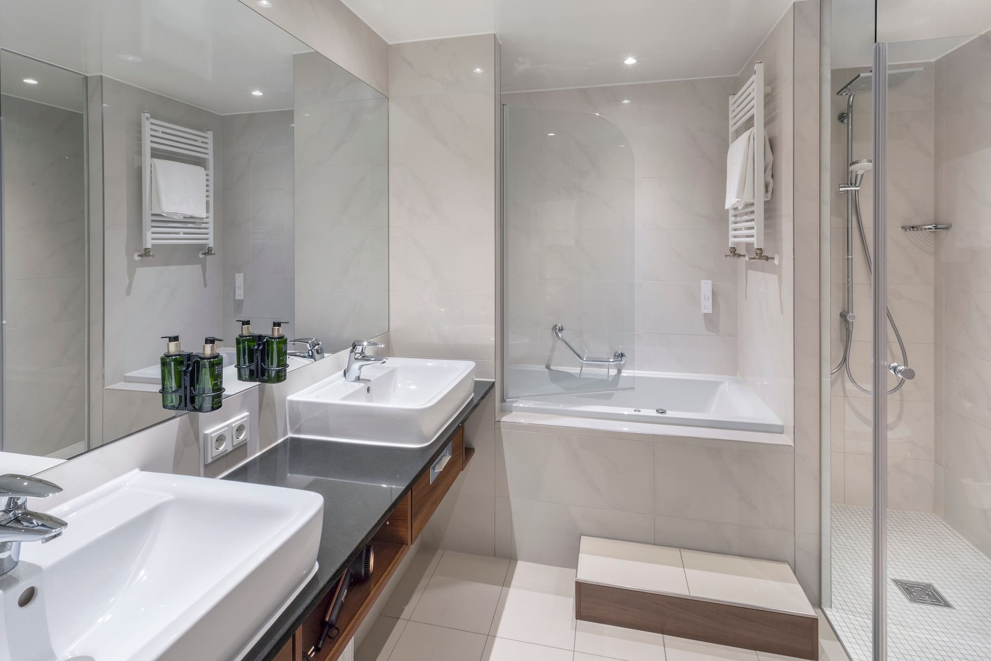 a bathroom with a bathtub and sink