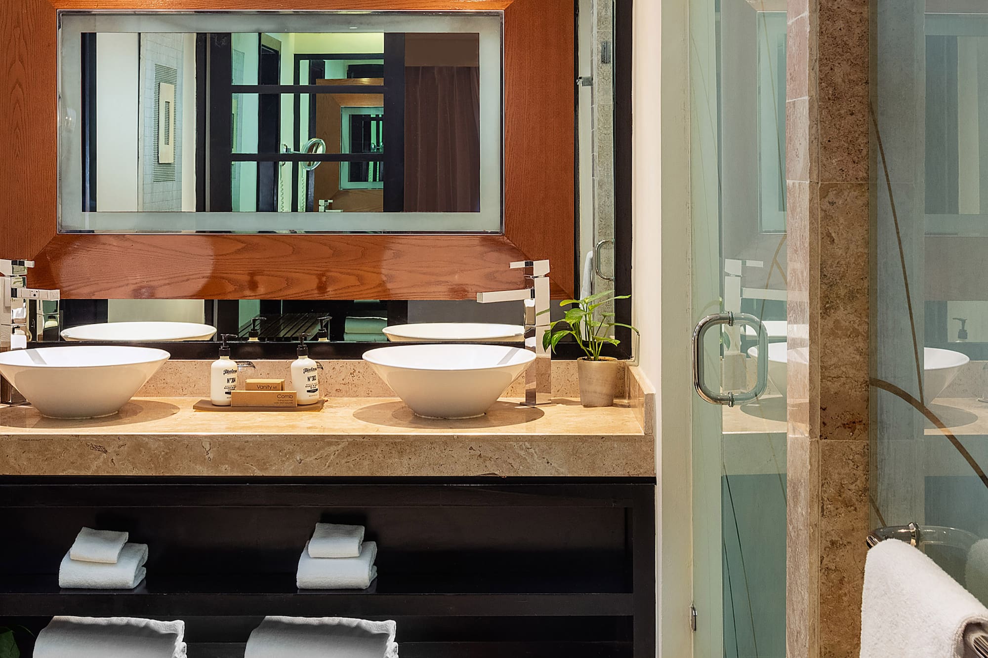 a bathroom with a mirror and sink