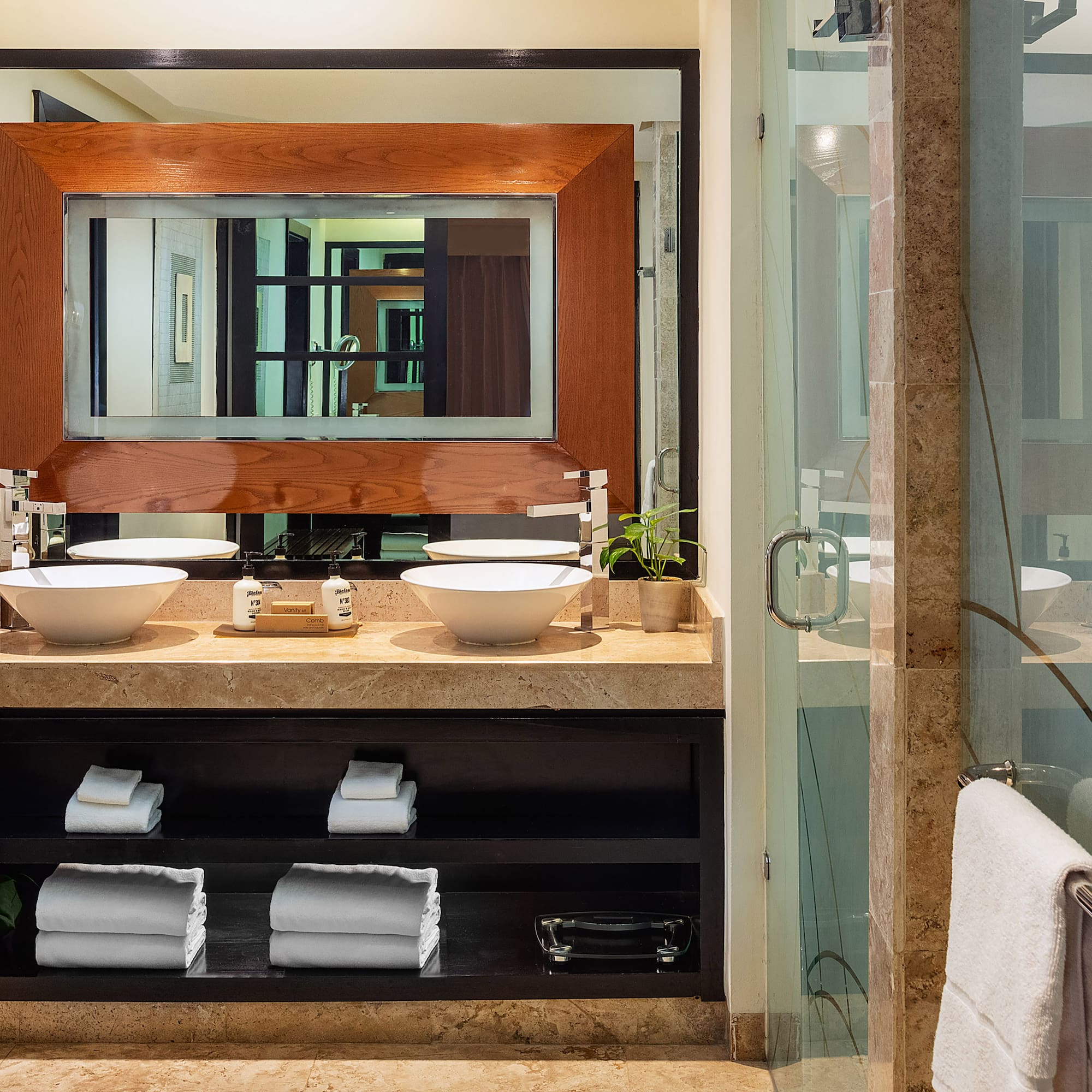 a bathroom with a mirror and sink