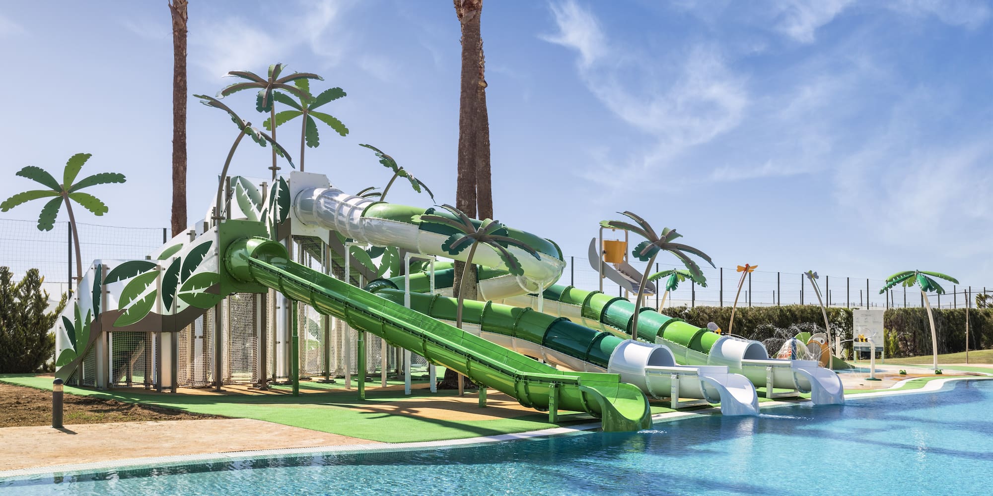 a water park with a pool and slides