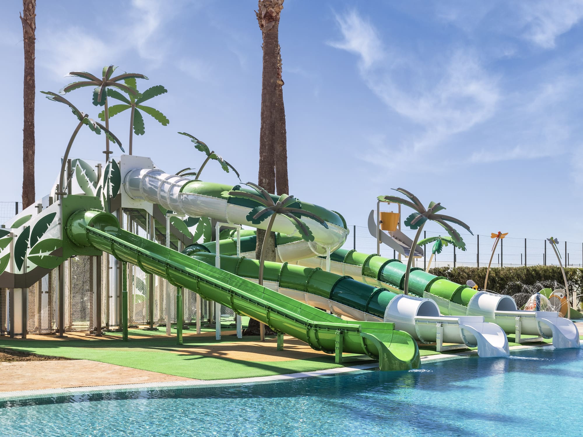 a water park with a pool and slides