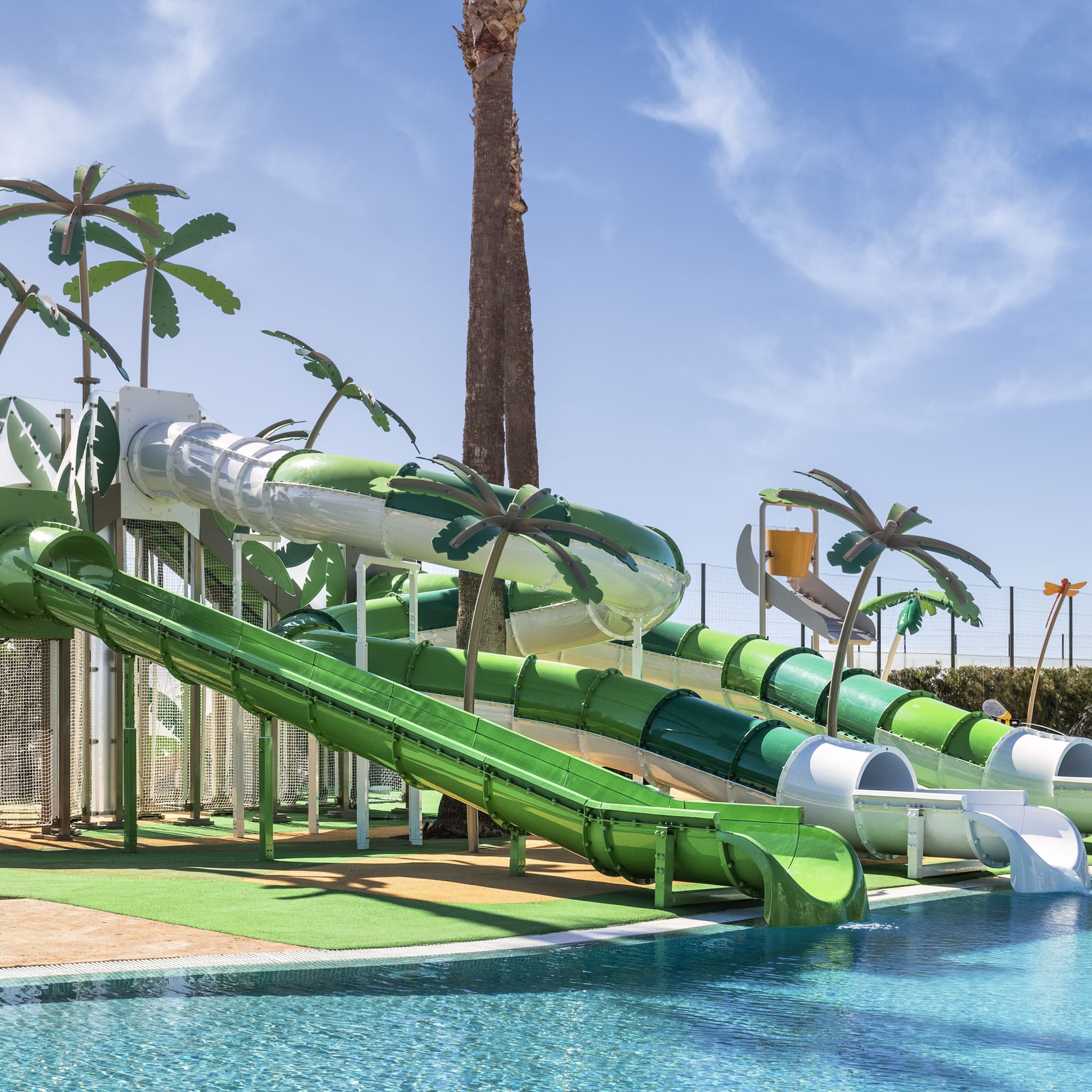 a water park with a pool and slides