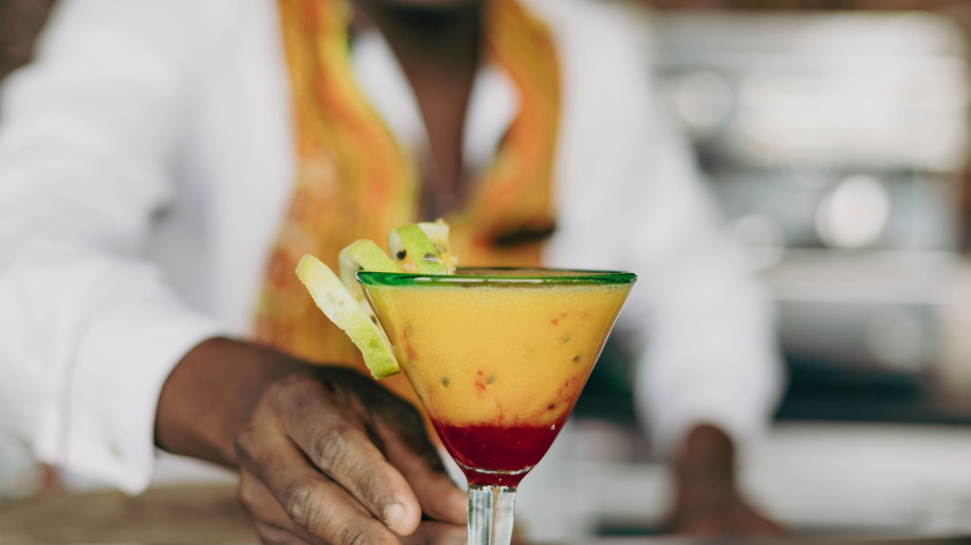 a man holding a drink