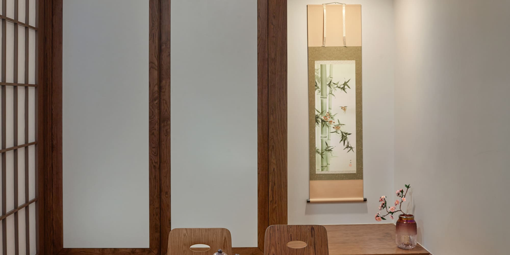 a room with a table and chairs