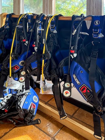 scuba gear on a rack