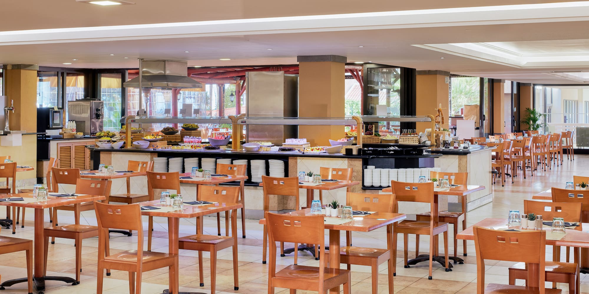 a restaurant with tables and chairs