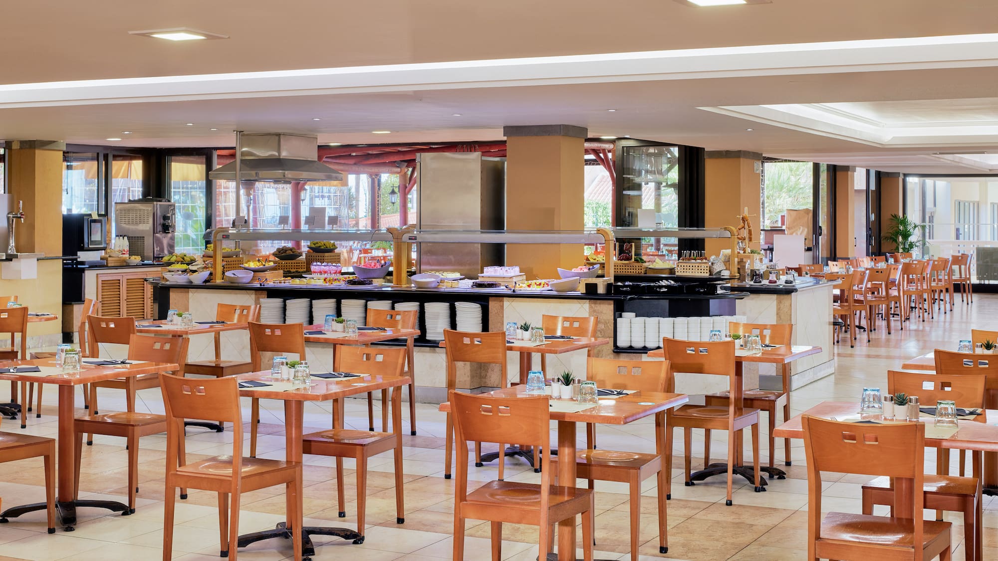a restaurant with tables and chairs