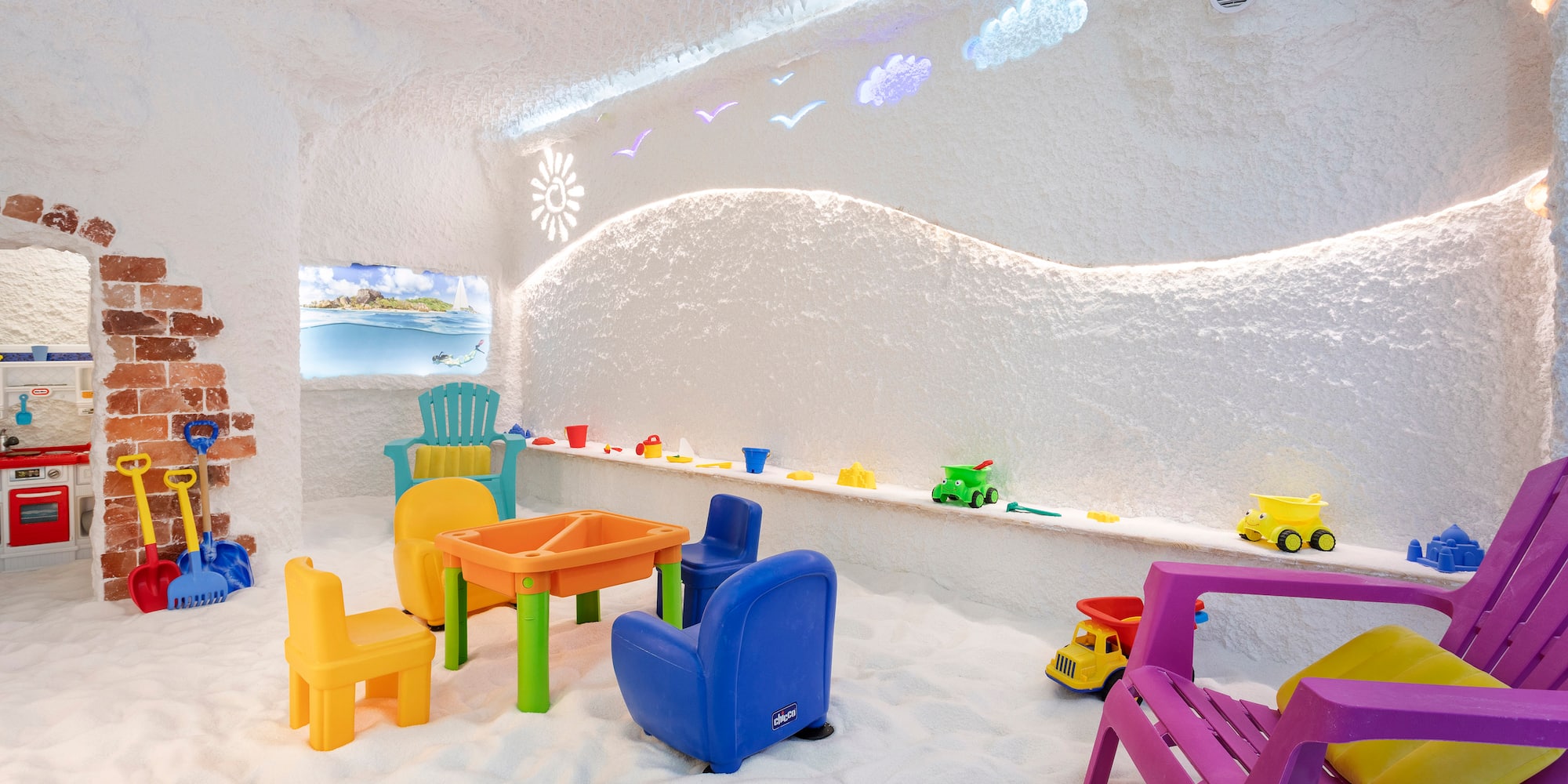 a room with a table and chairs