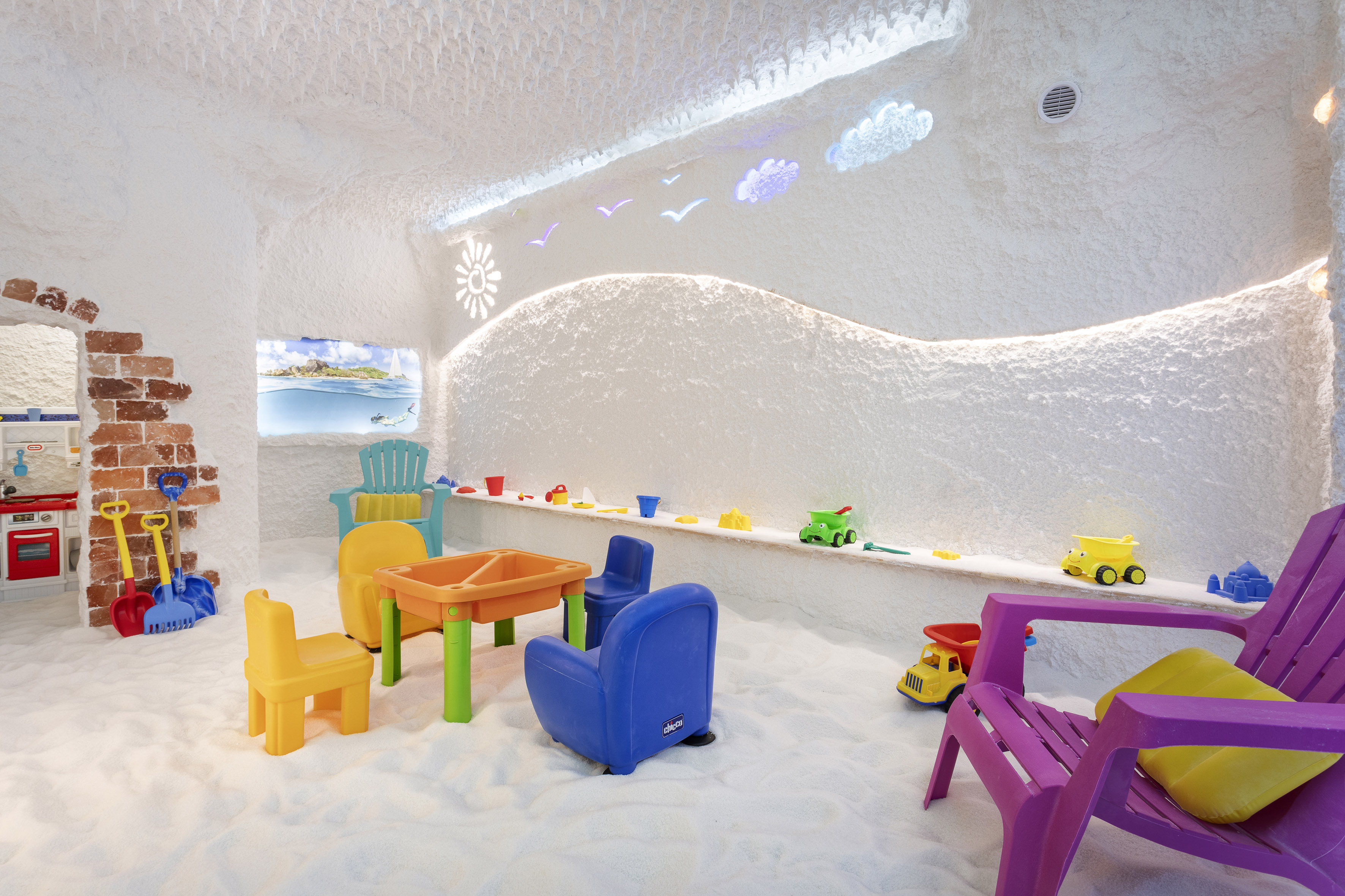 a room with a table and chairs