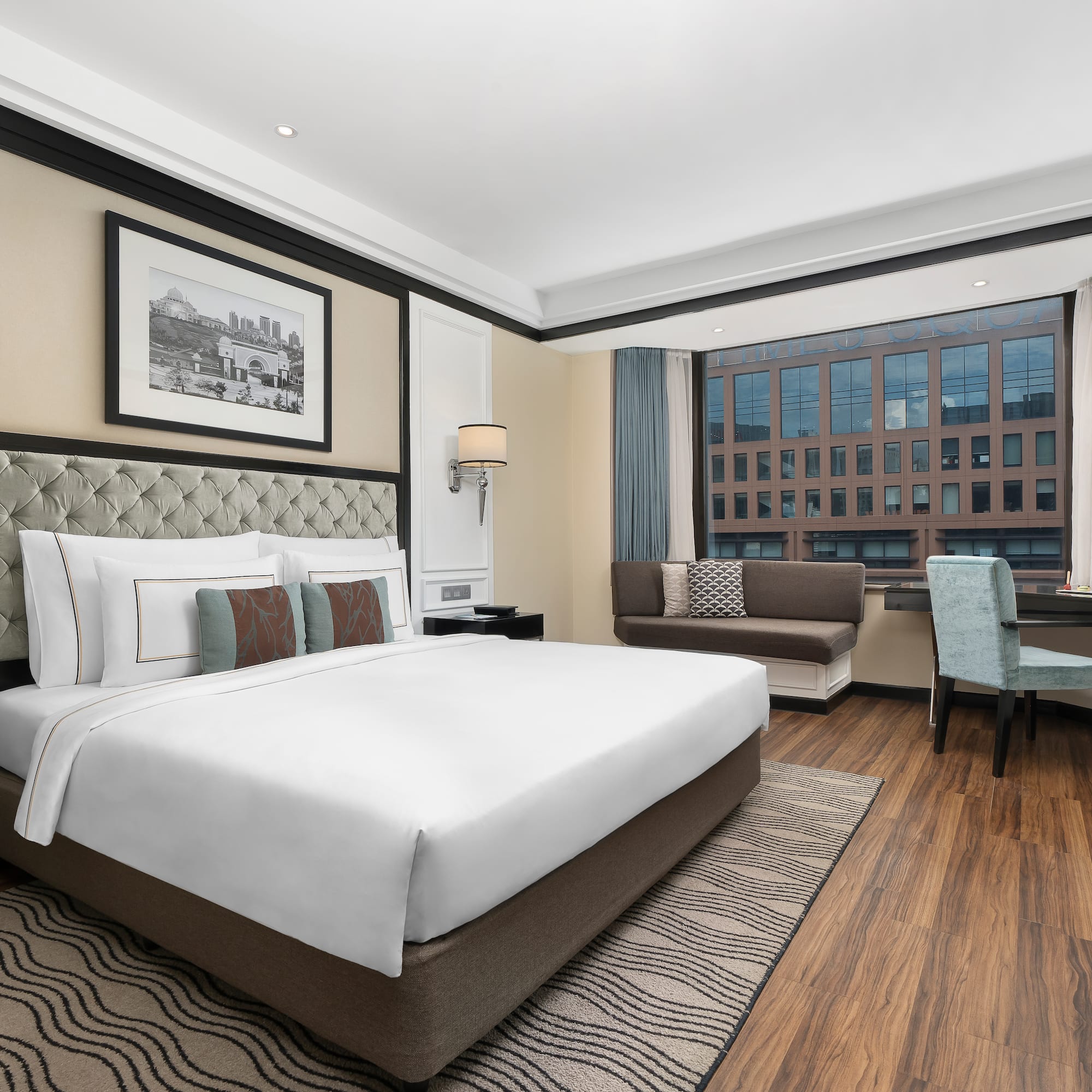 a bedroom with a bed and a chair