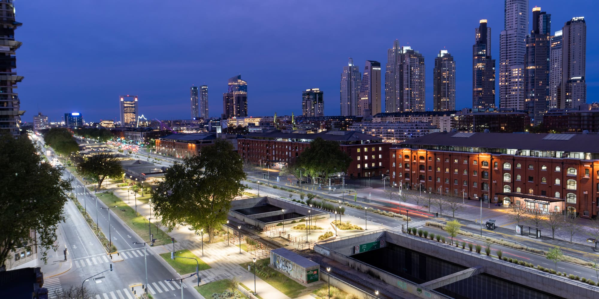 a city with many buildings and a street