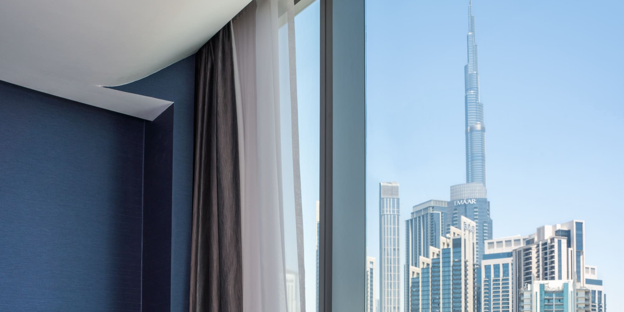 a window with a view of a city