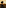 Silhouetted person with curly hair watching a golden sunset over a city skyline.
