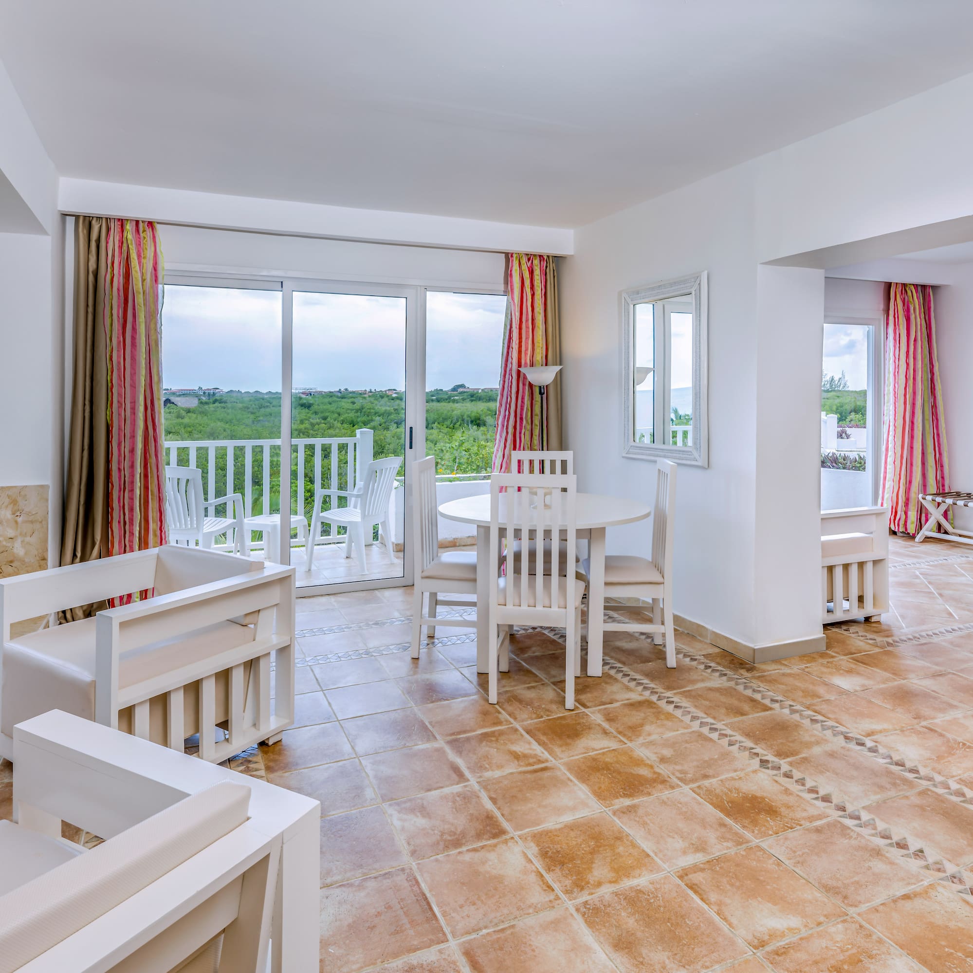 a room with a table and chairs