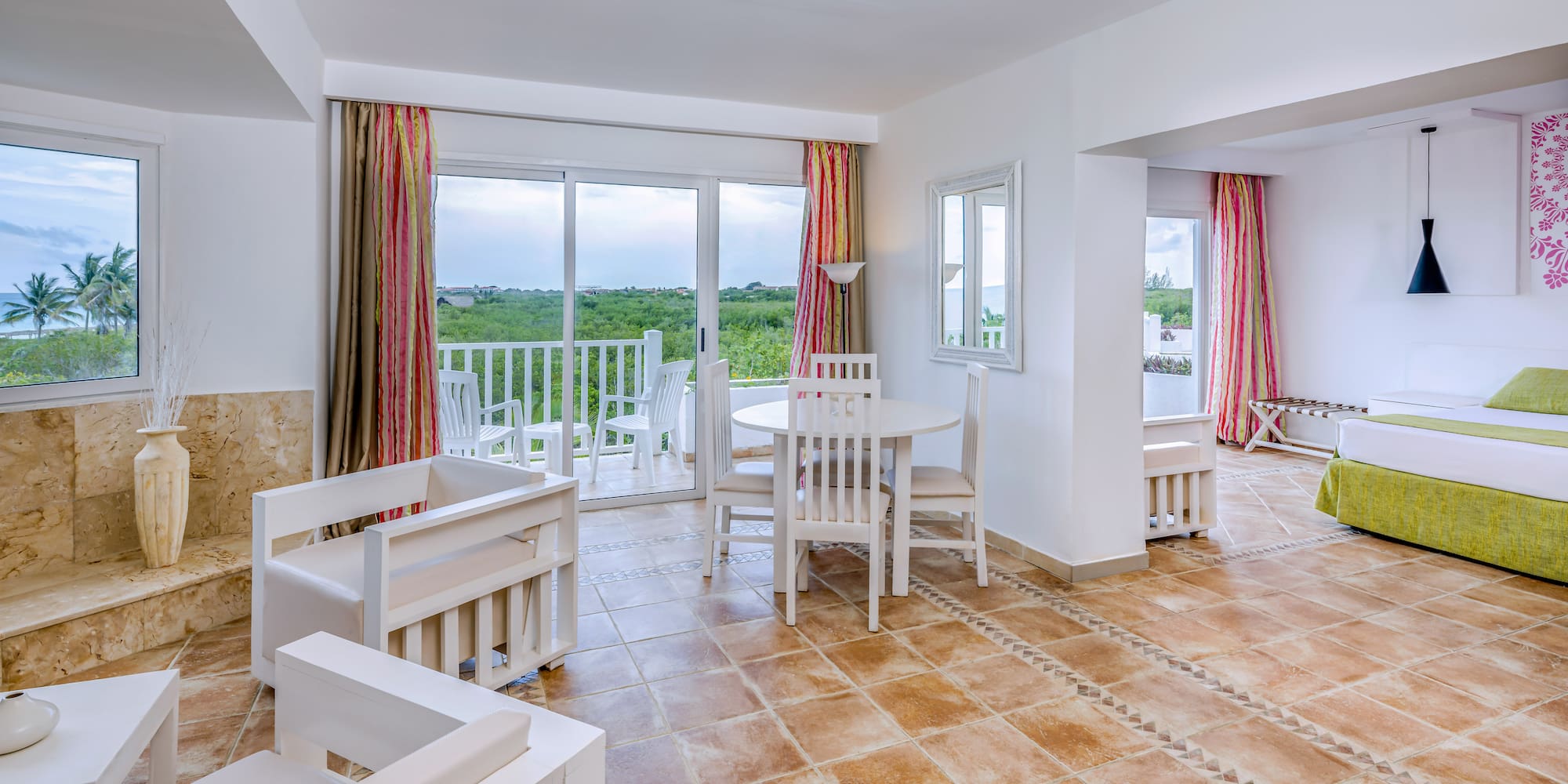 a room with a table and chairs