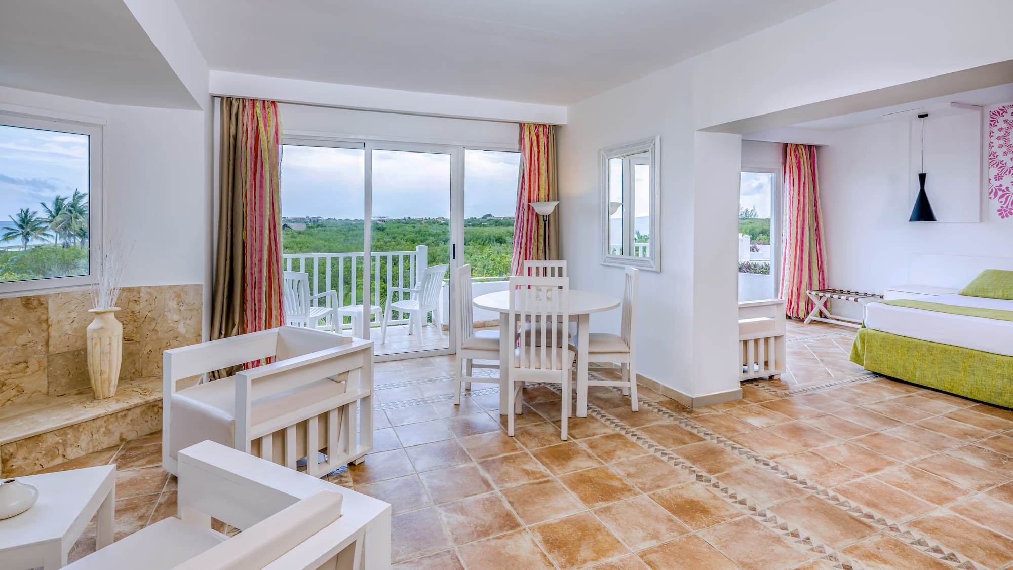 a room with a table and chairs