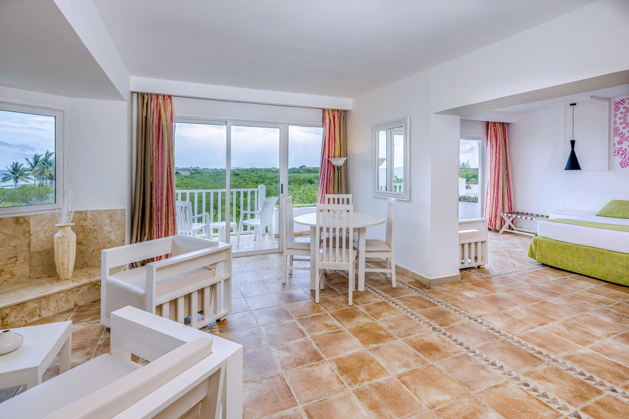 a room with a table and chairs