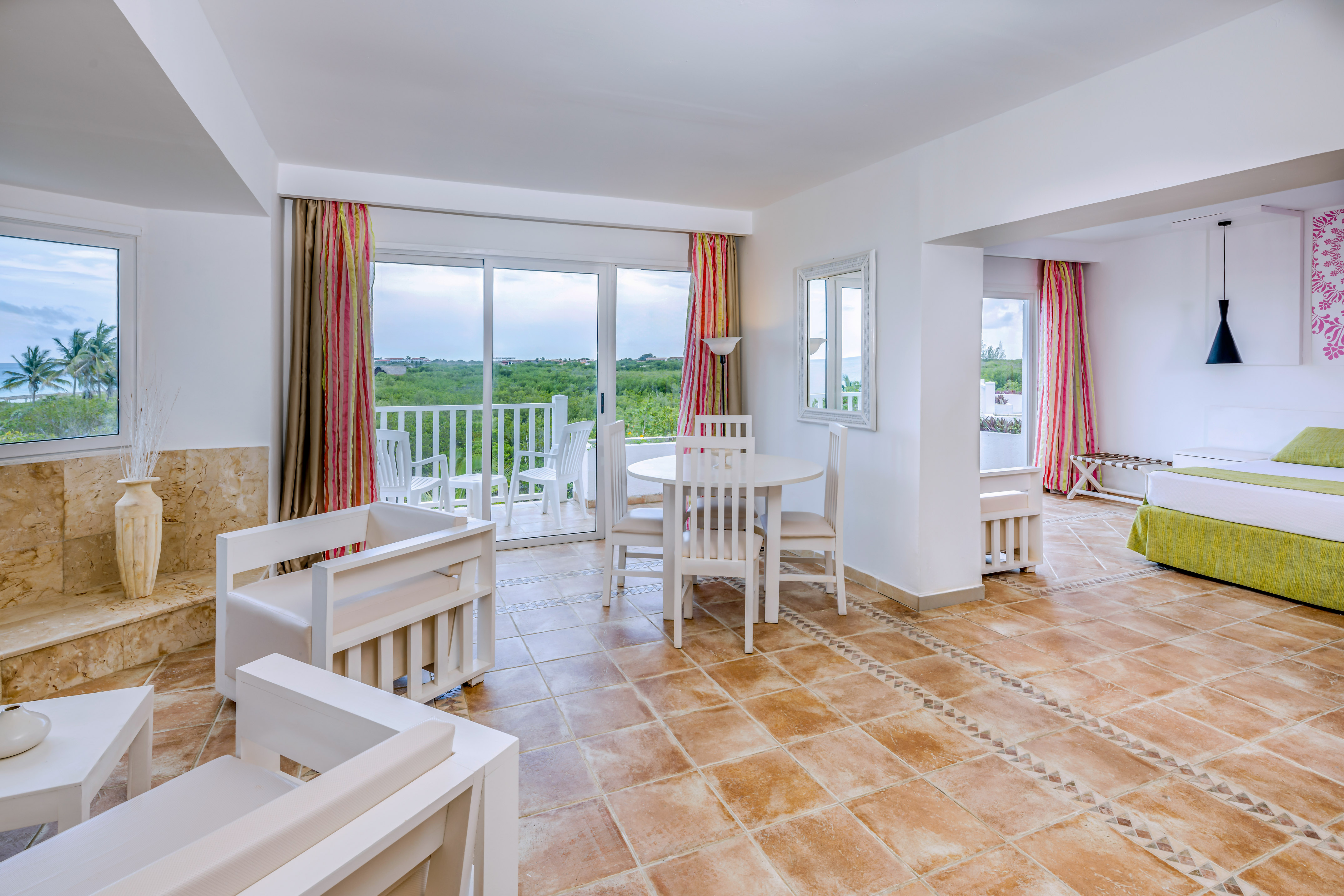 a room with a table and chairs