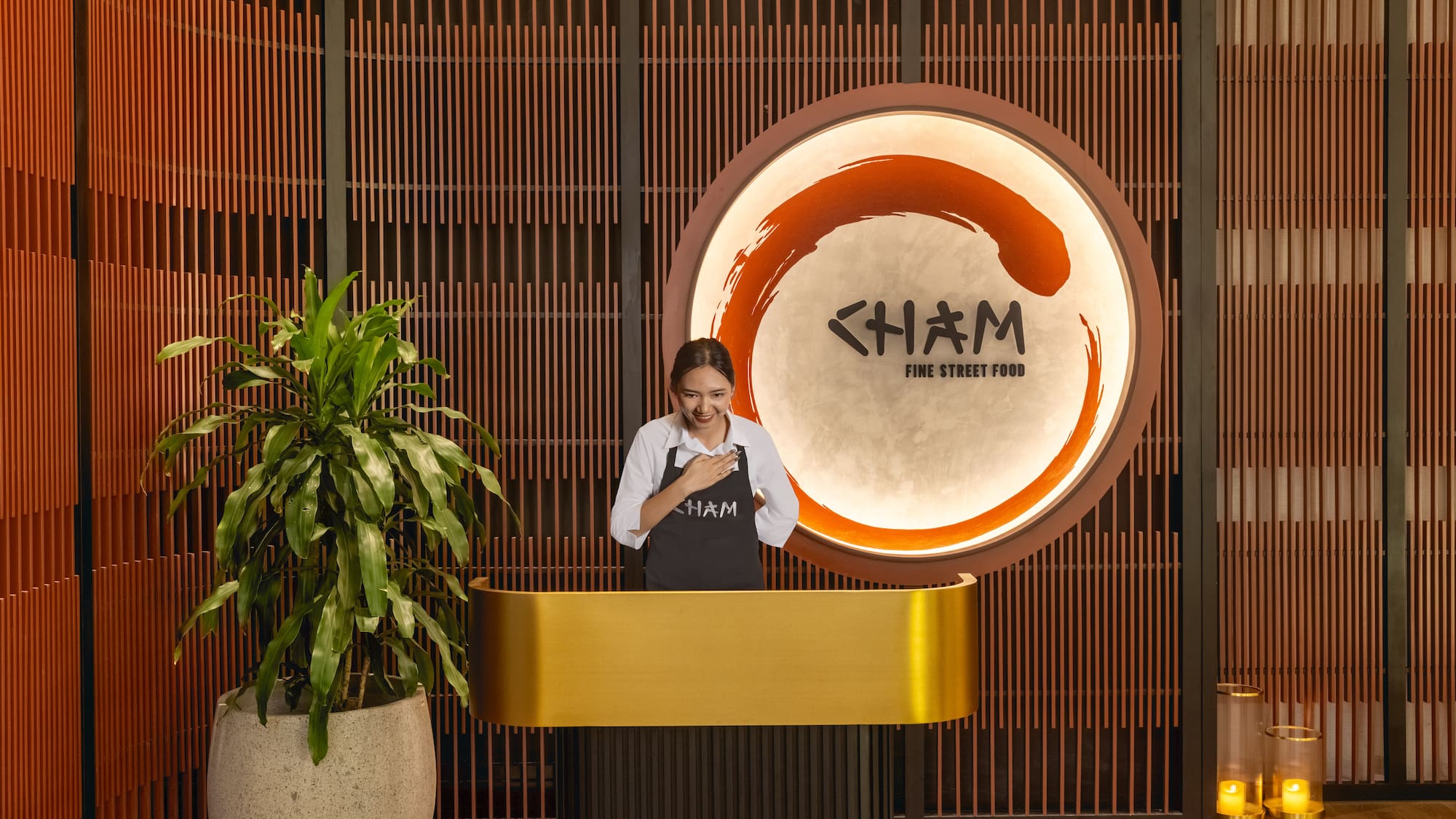 a woman standing behind a podium