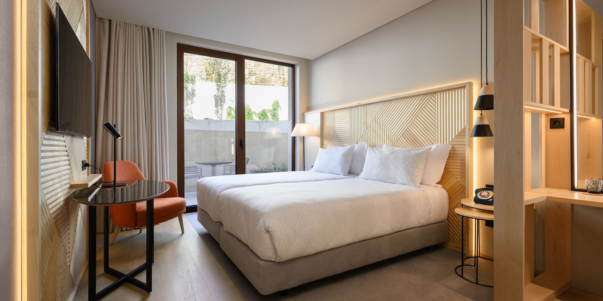 a room with a bed and a chair