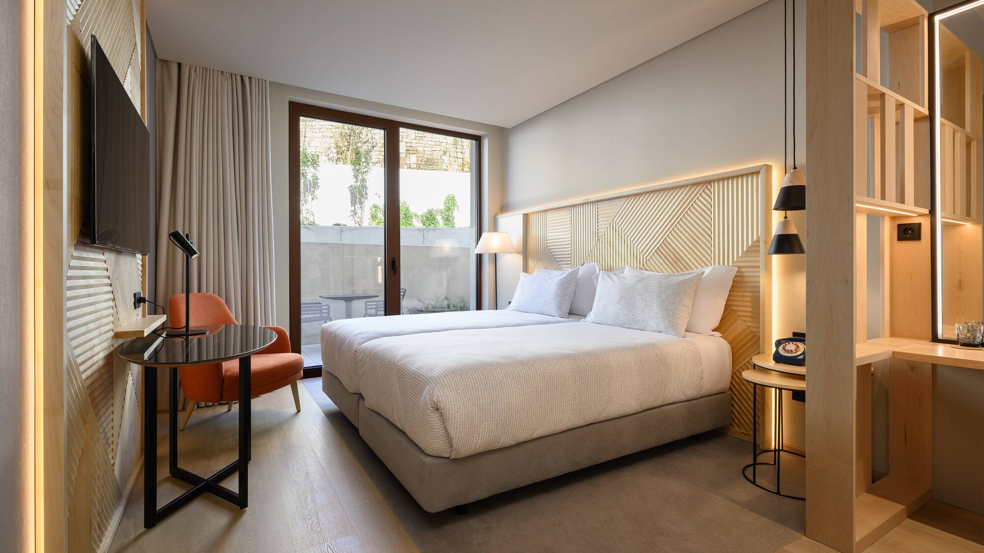 a room with a bed and a chair