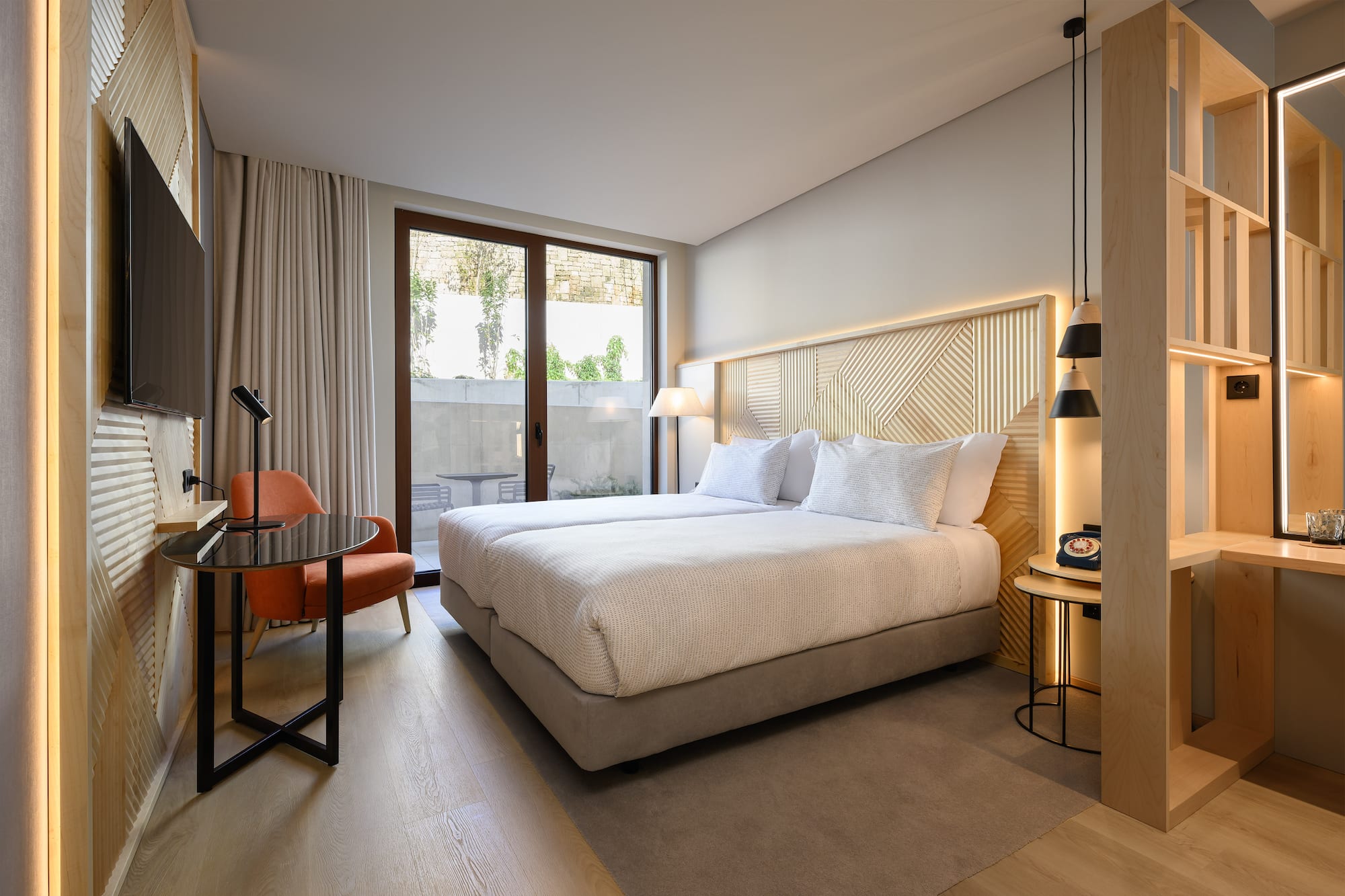 a room with a bed and a chair