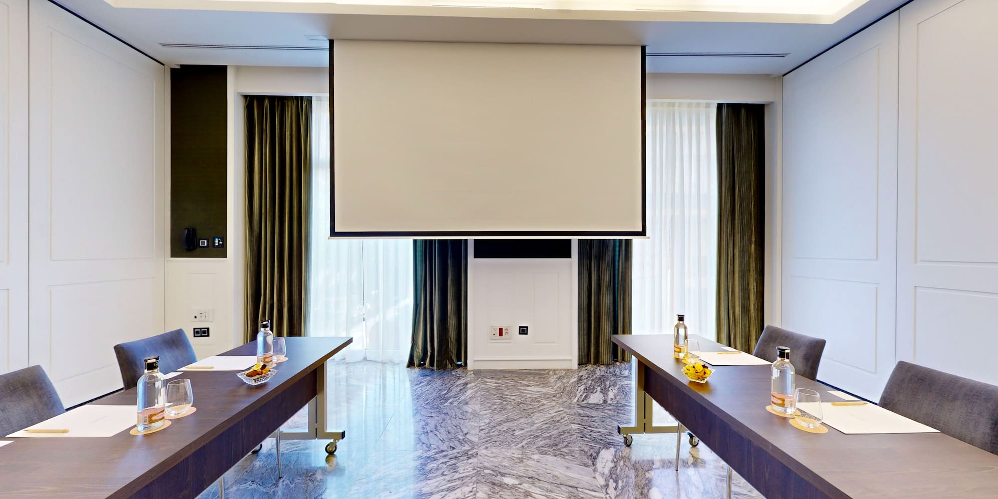 a room with tables and chairs