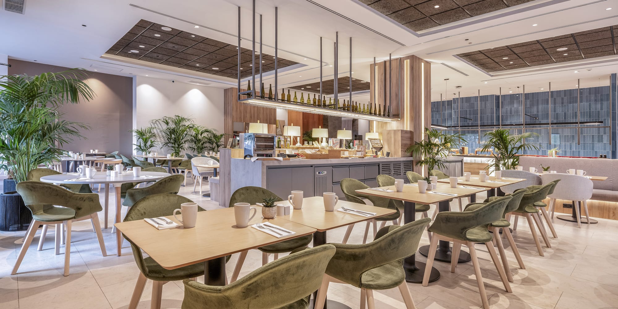 a restaurant with tables and chairs