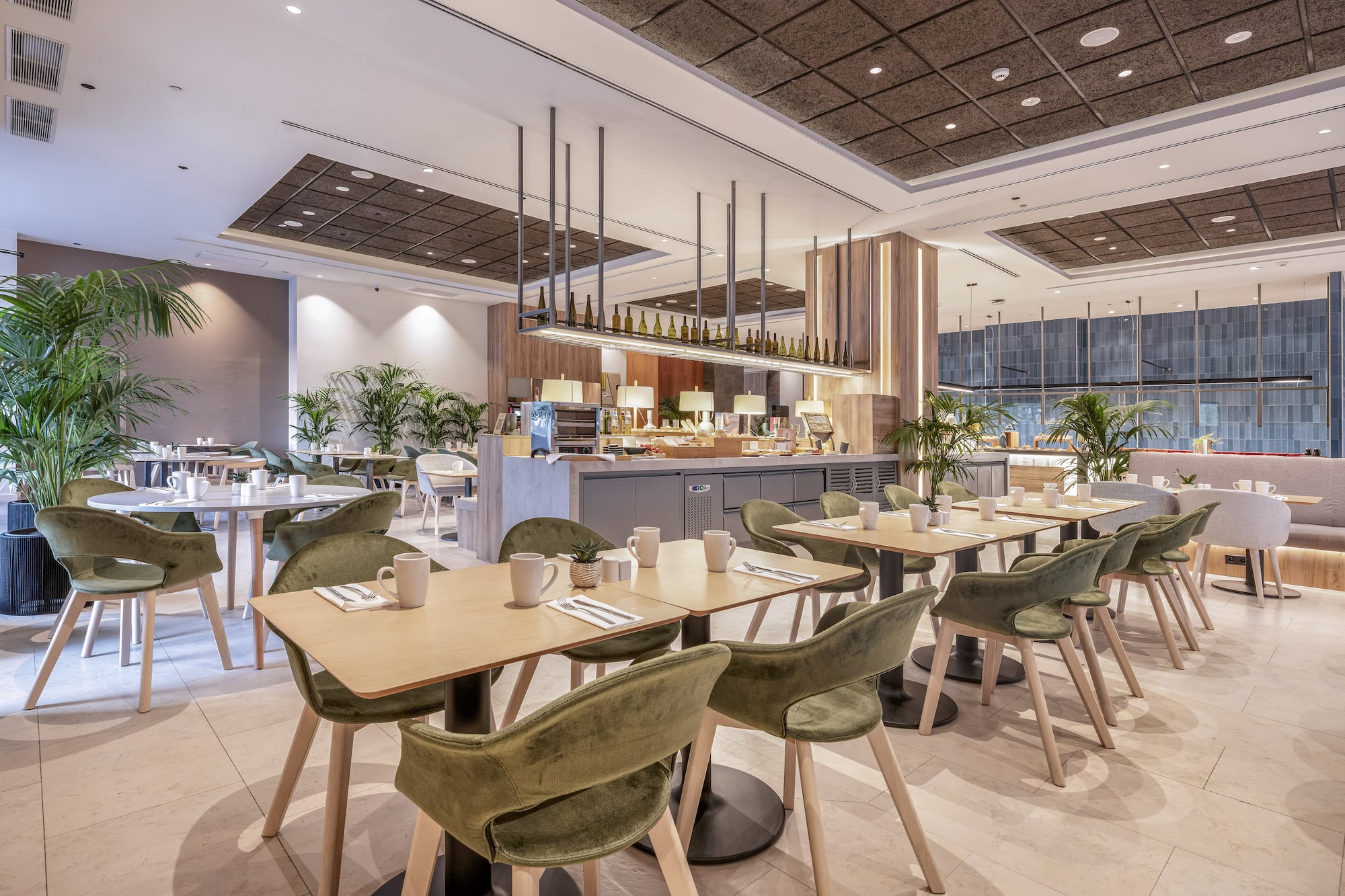 a restaurant with tables and chairs