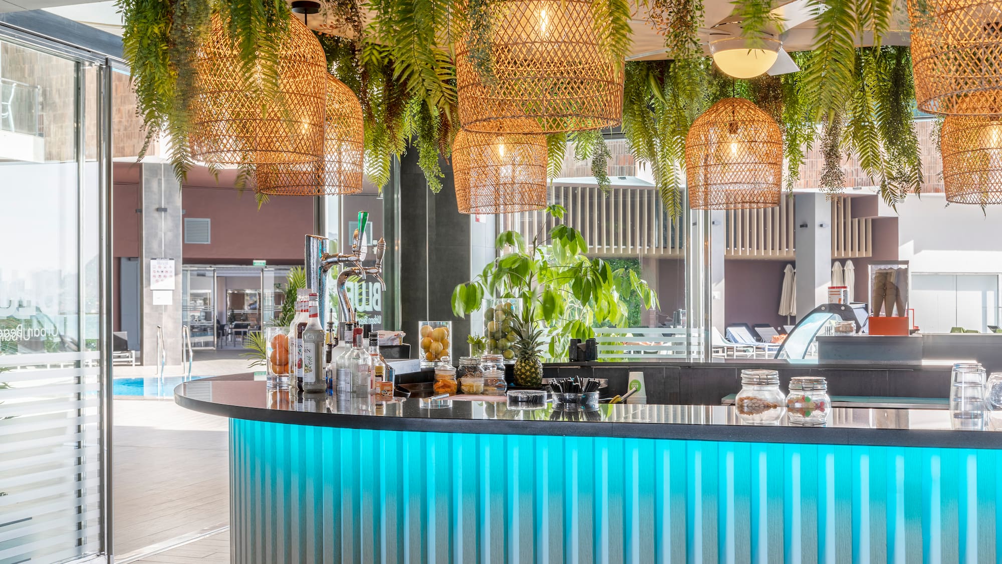 a bar with a light fixture and lights