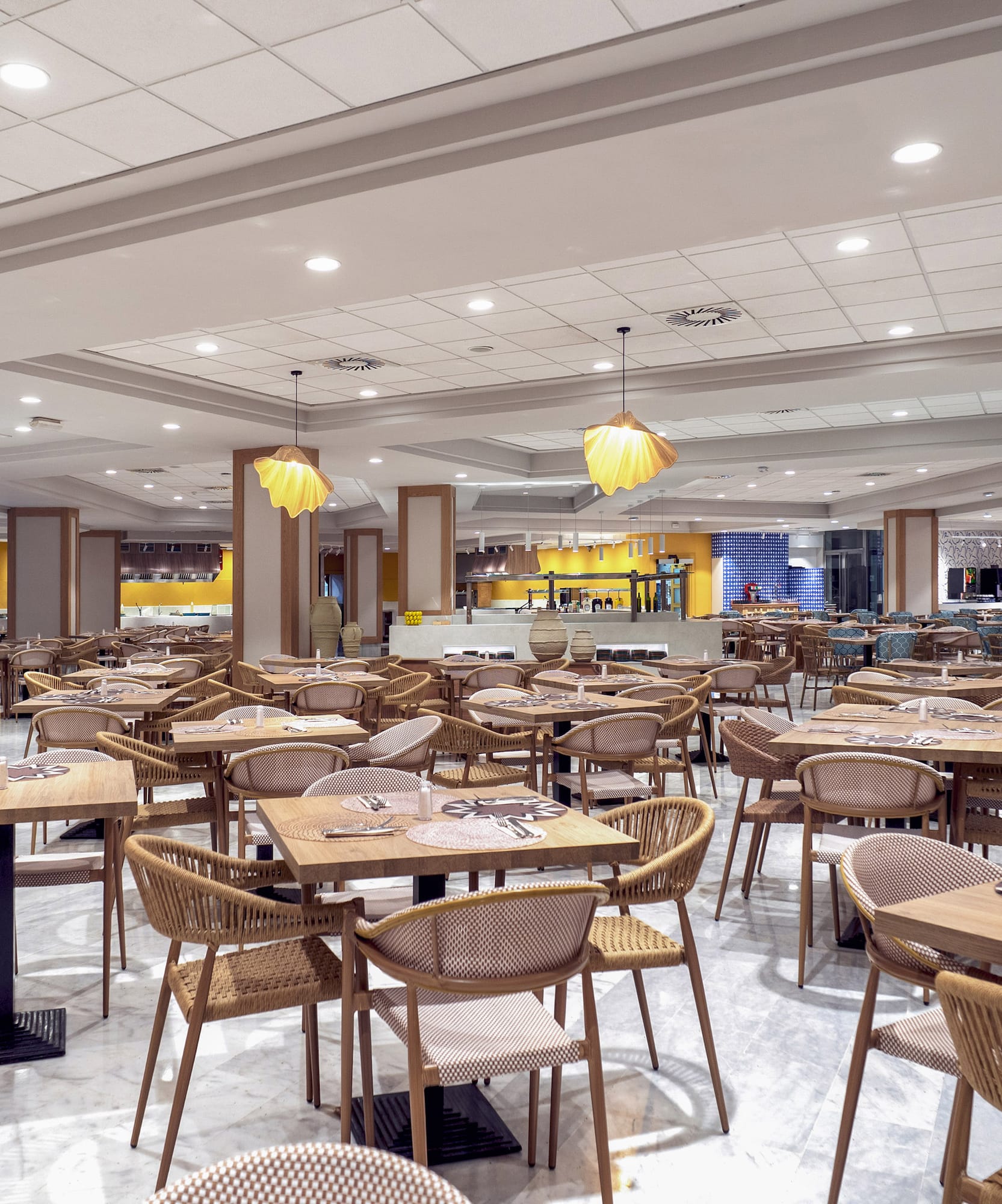 a large room with tables and chairs