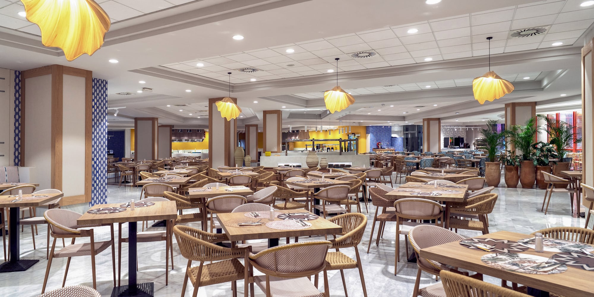 a large room with tables and chairs