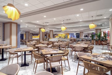 a large room with tables and chairs