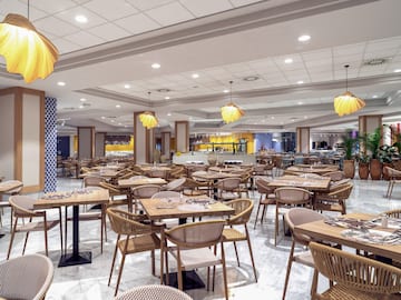 a large room with tables and chairs