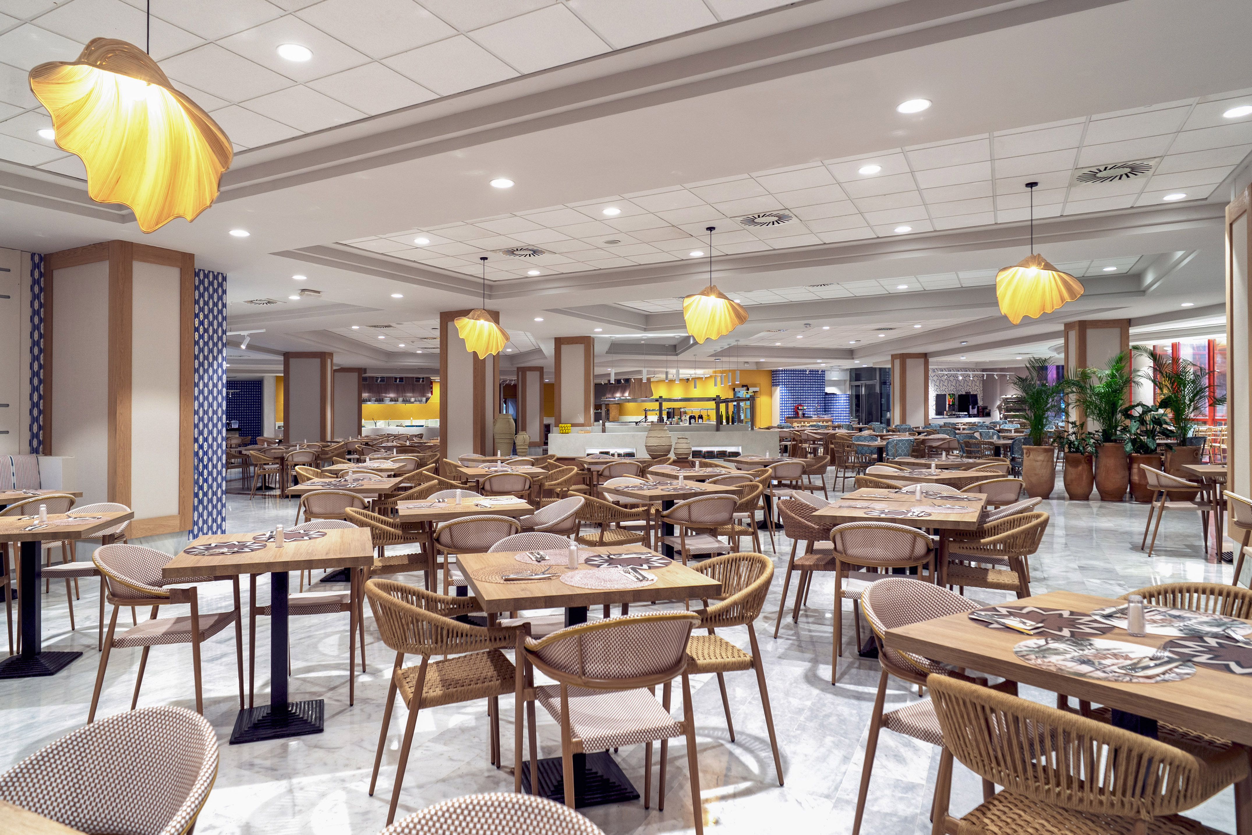 a large room with tables and chairs