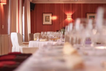 a room with tables and chairs