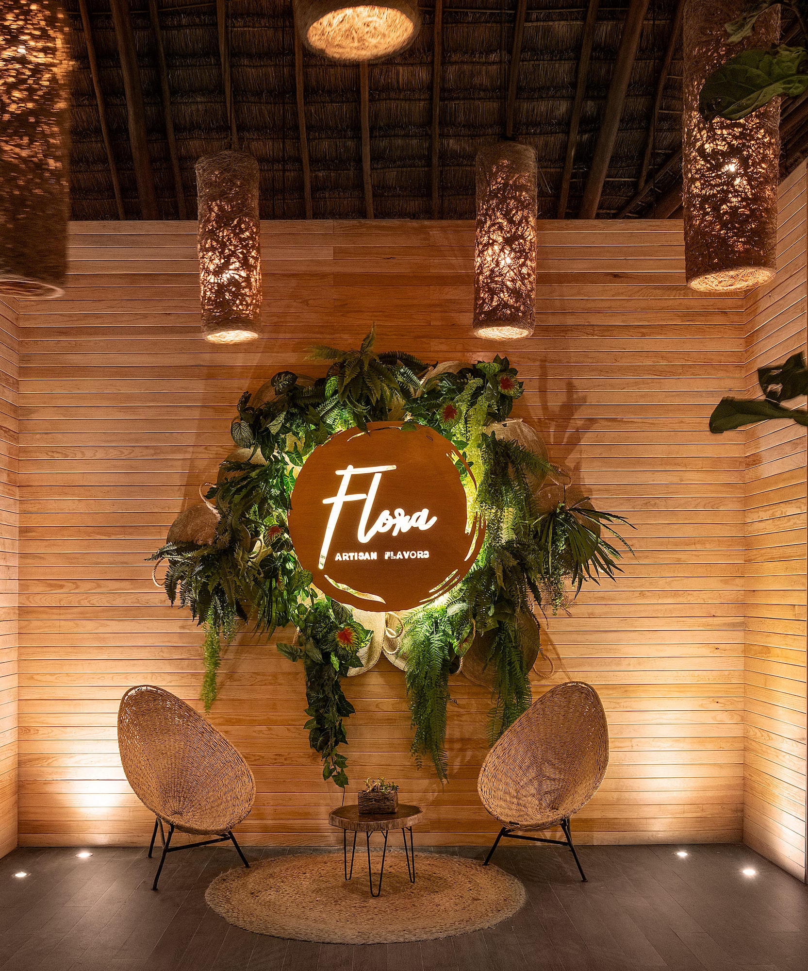 a room with a sign and chairs