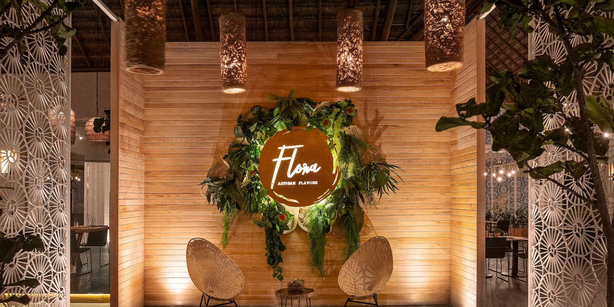 a room with a sign and chairs