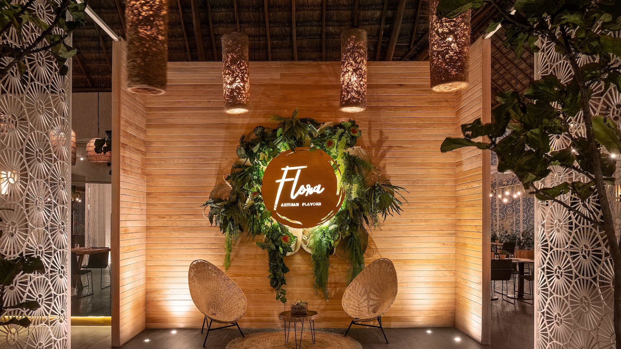 a room with a sign and chairs